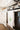 green botanical french linen dish towel on stove