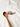 White apron with a snail design and wooden spoon on a light background