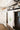 green botanical french linen dish towel on stove