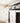 kitchen stove with white linen decorative tea towel featuring penguin